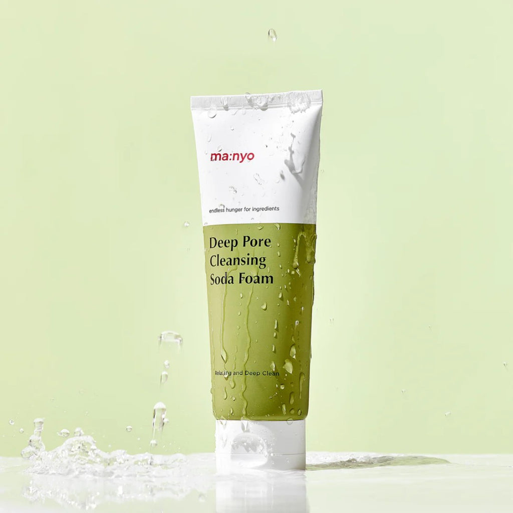 ma:nyo Purifying Cleansing Soda Foam 150ml in a white and green tube, with water splashes.