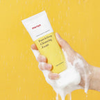 ma:nyo Pure&Deep Cleansing Foam 200ml held in hand, showcasing rich foam and clean packaging.