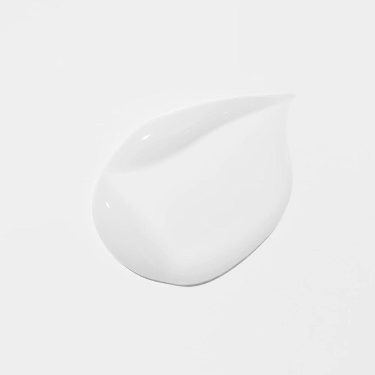 A smooth, glossy white cream or gel dollop on a clean, light gray background. VT Cosmetics Reedle Shot 300 Essence 50ml